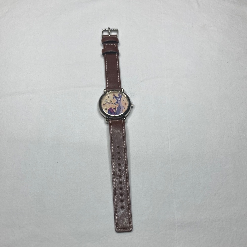 Lady and the tramp watch from Avon and quartz all brown #47